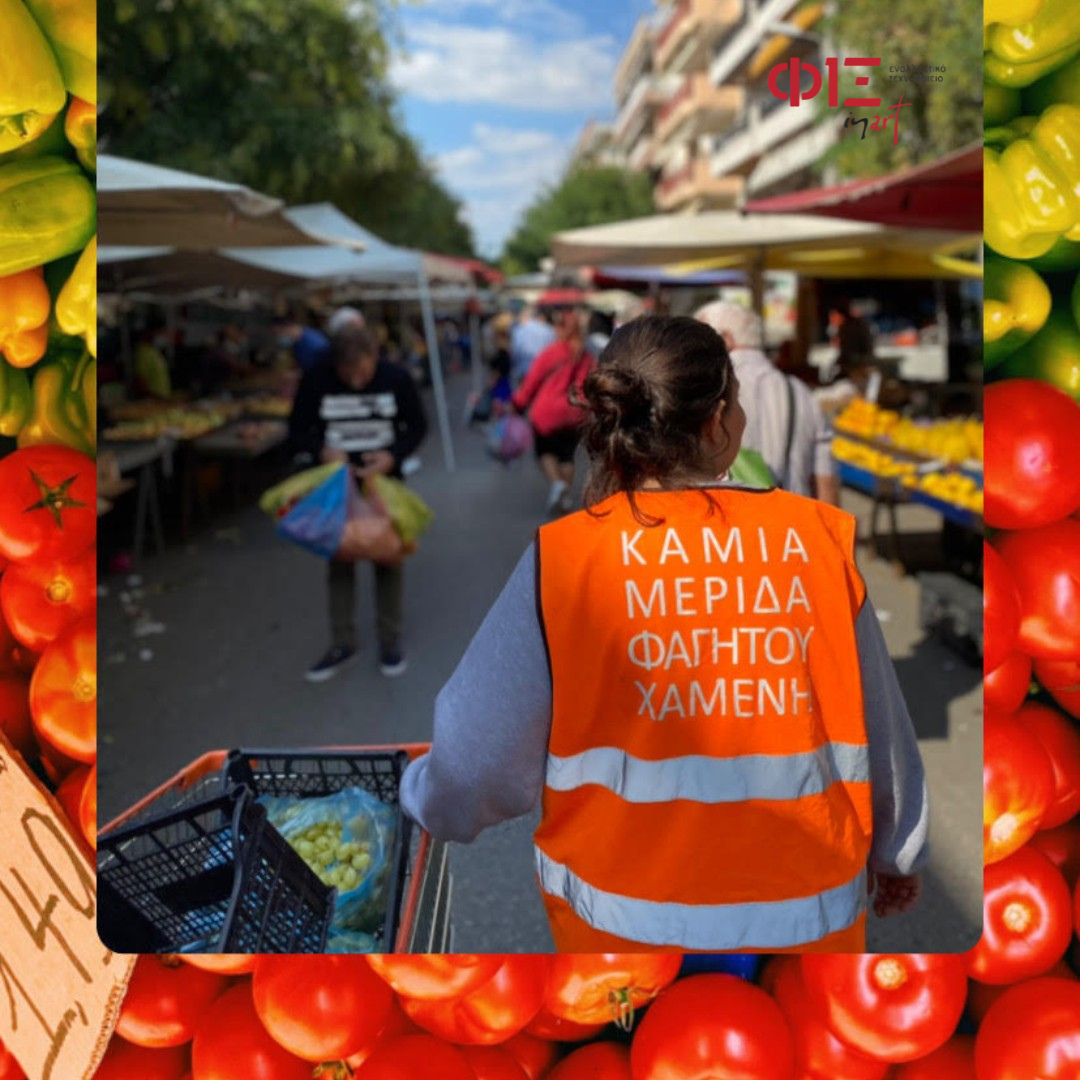 Food rescue pickup at the market — volunteer in ΦΙΞ vest